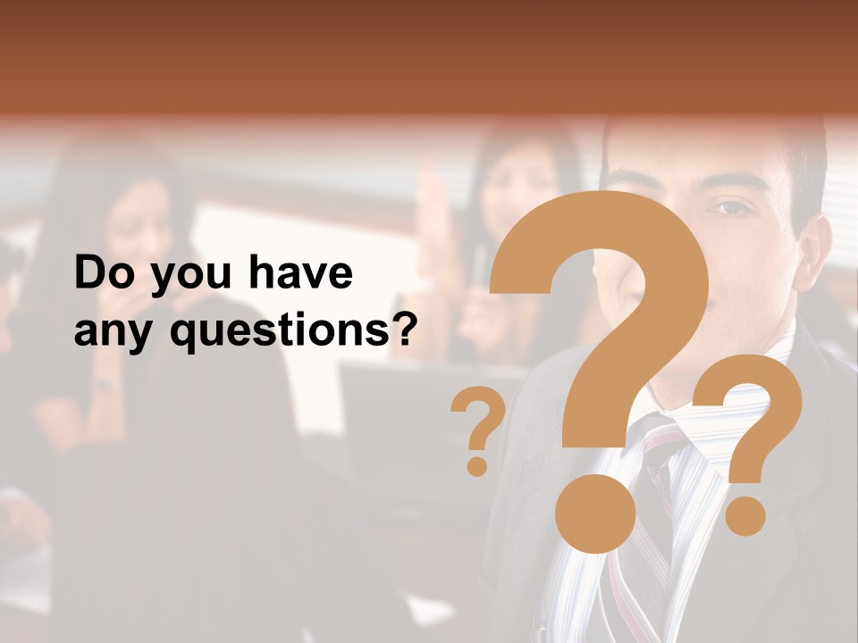 A Man In A Suit And Tie Standing In Front Of A Group Of People PowerPoint Template