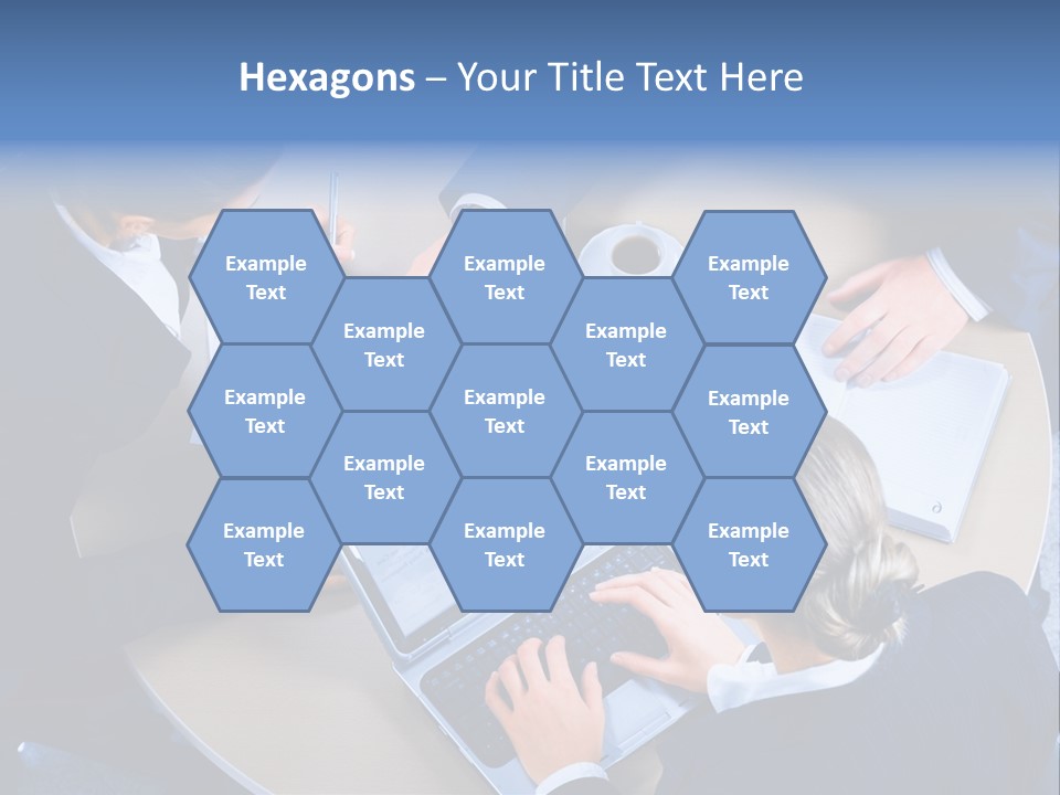 A Group Of People Sitting Around A Table Working On Laptops PowerPoint Template