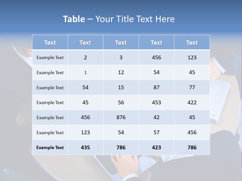 A Group Of People Sitting Around A Table Working On Laptops PowerPoint Template