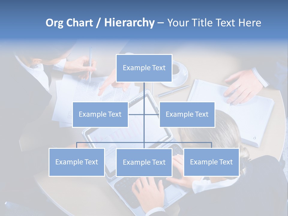 A Group Of People Sitting Around A Table Working On Laptops PowerPoint Template