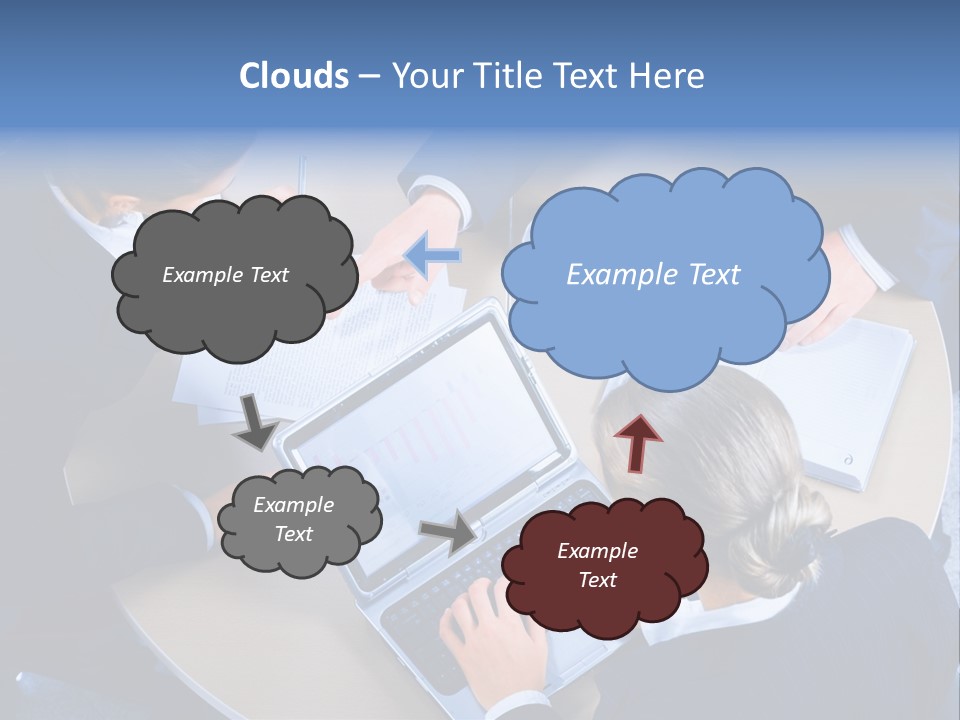 A Group Of People Sitting Around A Table Working On Laptops PowerPoint Template