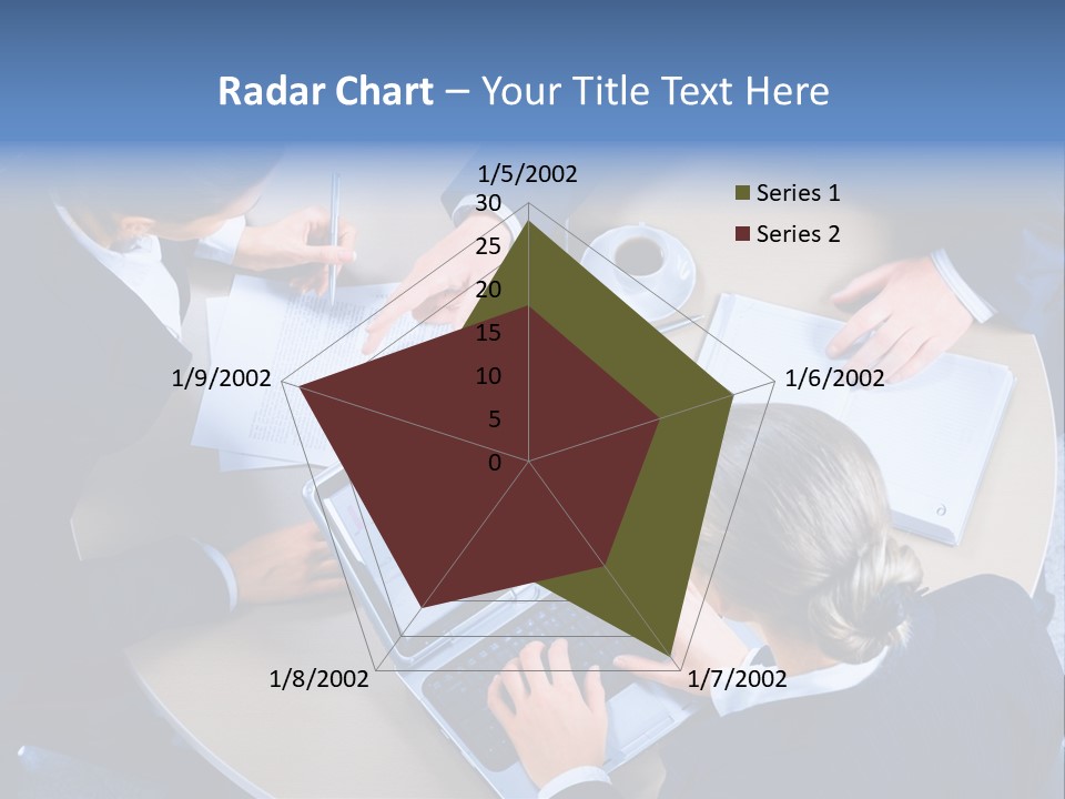 A Group Of People Sitting Around A Table Working On Laptops PowerPoint Template