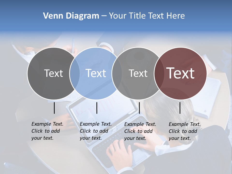 A Group Of People Sitting Around A Table Working On Laptops PowerPoint Template