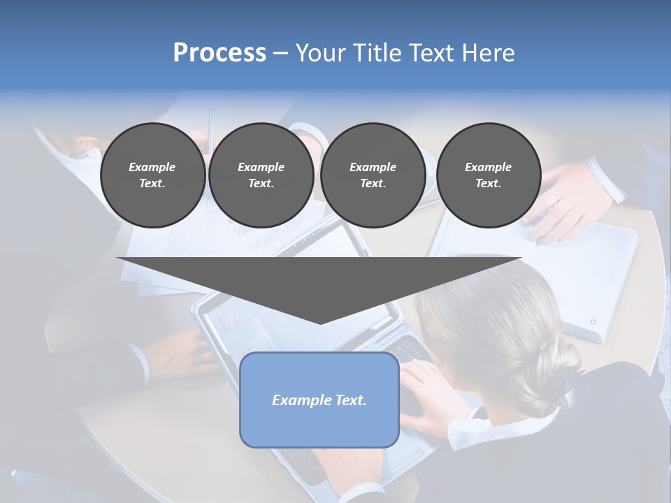 A Group Of People Sitting Around A Table Working On Laptops PowerPoint Template