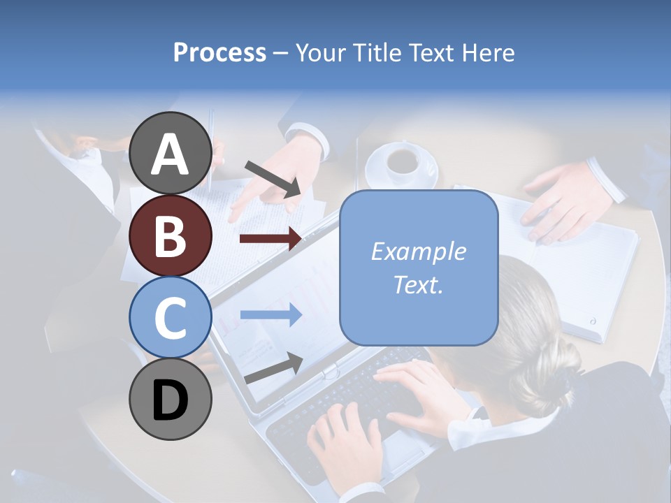 A Group Of People Sitting Around A Table Working On Laptops PowerPoint Template