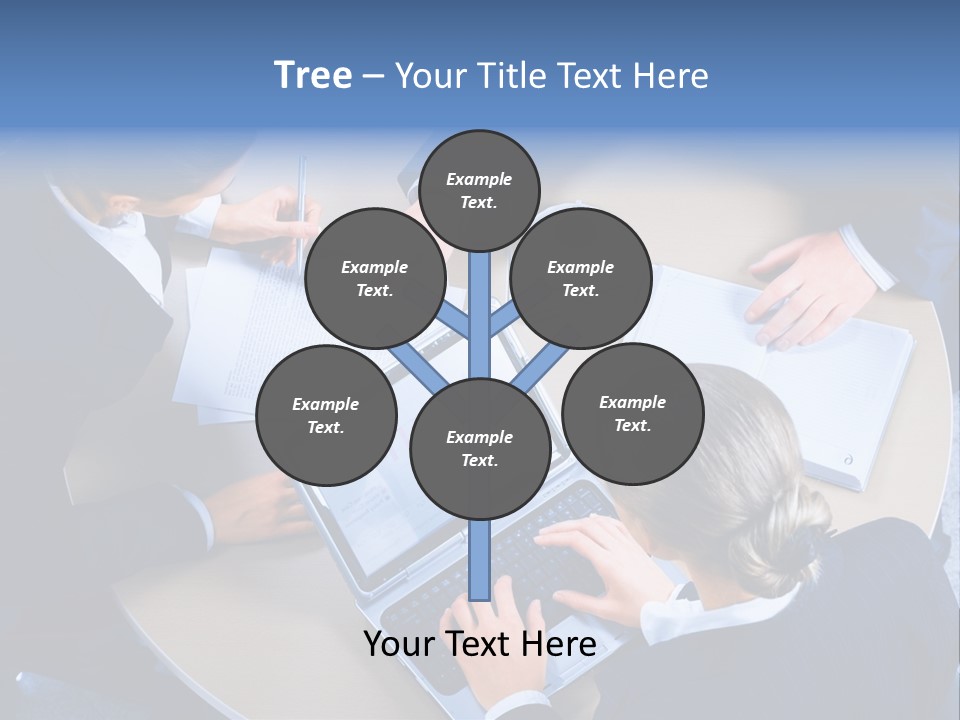 A Group Of People Sitting Around A Table Working On Laptops PowerPoint Template