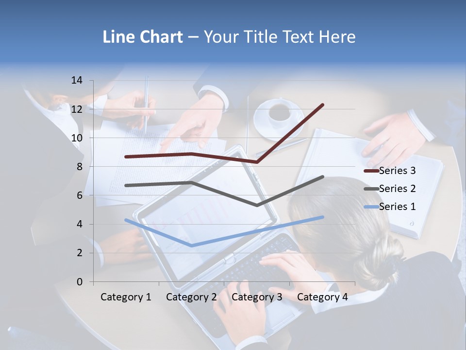A Group Of People Sitting Around A Table Working On Laptops PowerPoint Template