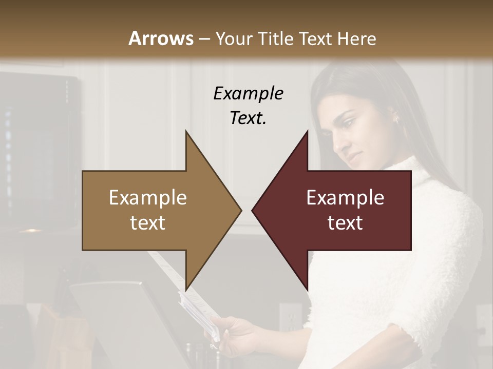 A Woman Using A Laptop Computer In A Kitchen PowerPoint Template