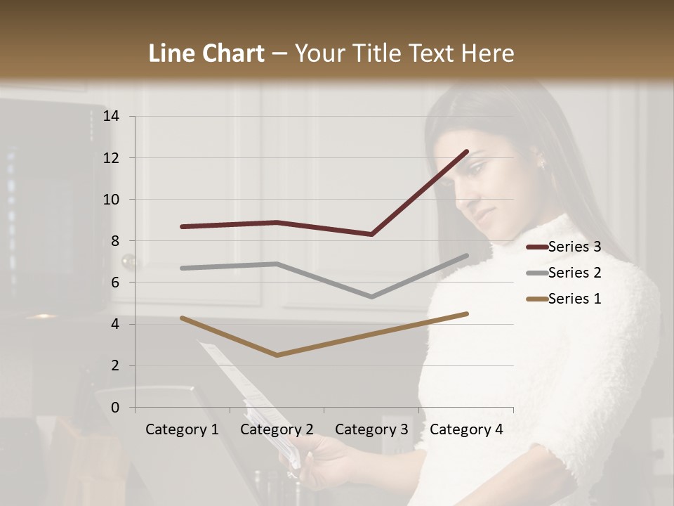 A Woman Using A Laptop Computer In A Kitchen PowerPoint Template