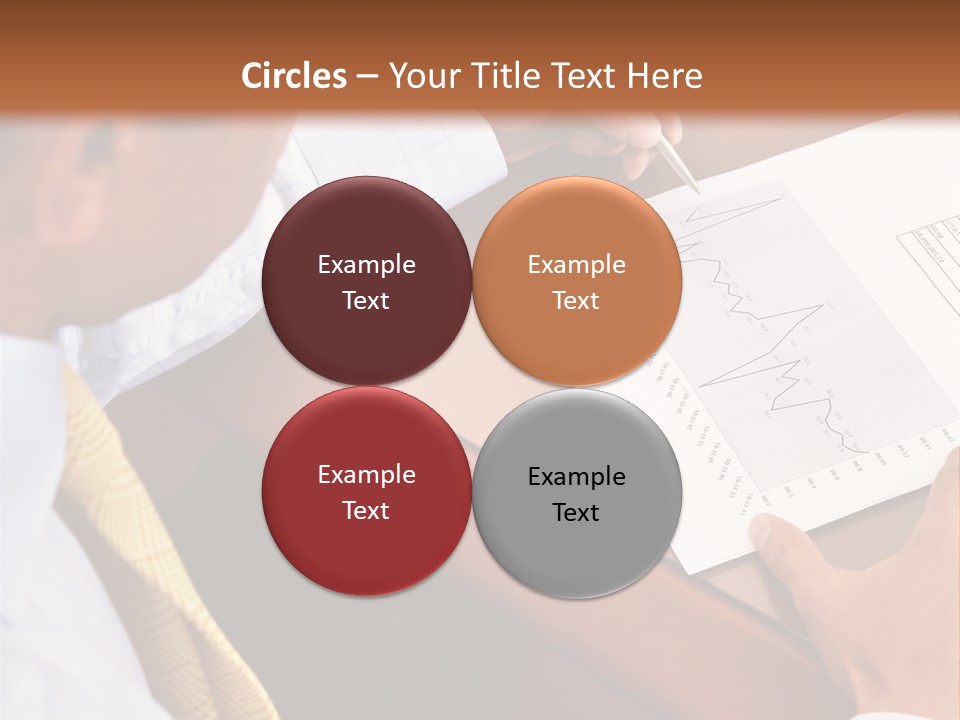 A Man Sitting At A Desk Writing On A Piece Of Paper PowerPoint Template