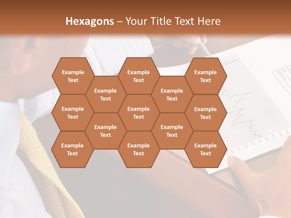 A Man Sitting At A Desk Writing On A Piece Of Paper PowerPoint Template