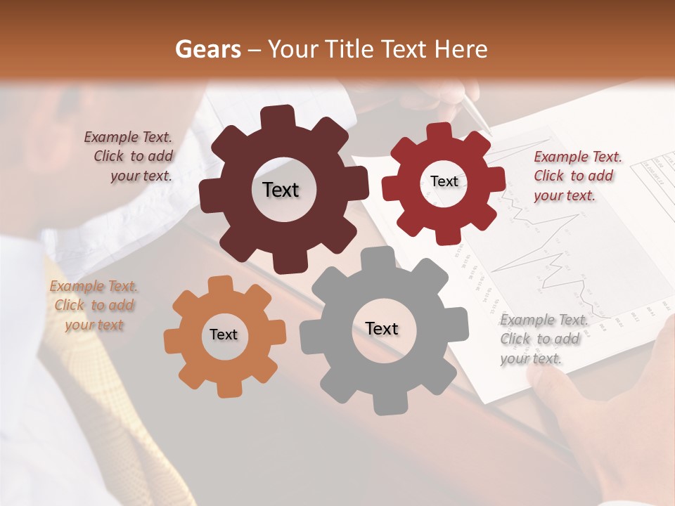 A Man Sitting At A Desk Writing On A Piece Of Paper PowerPoint Template