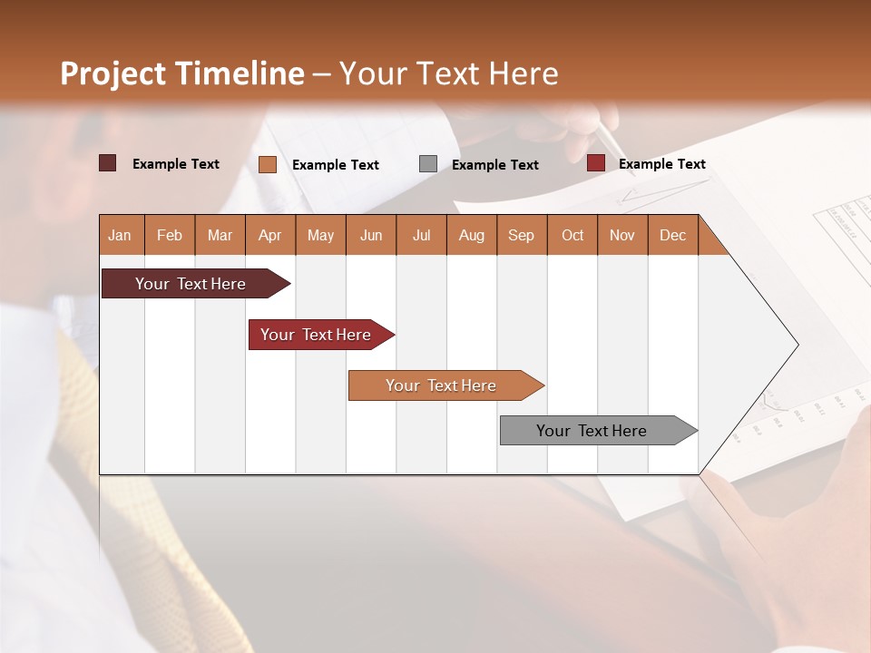 A Man Sitting At A Desk Writing On A Piece Of Paper PowerPoint Template
