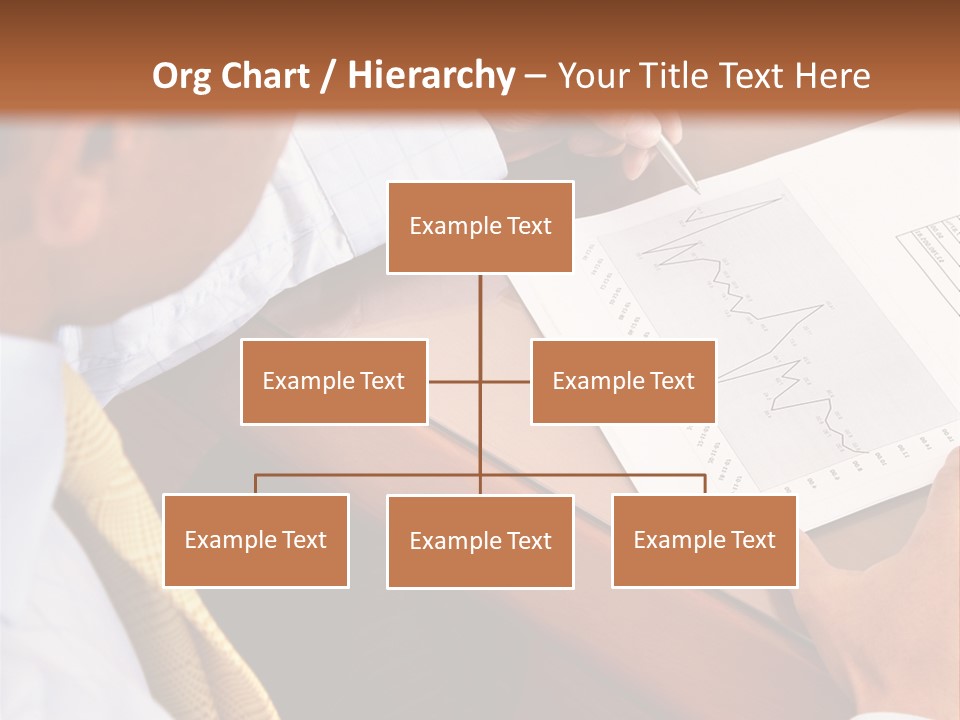 A Man Sitting At A Desk Writing On A Piece Of Paper PowerPoint Template