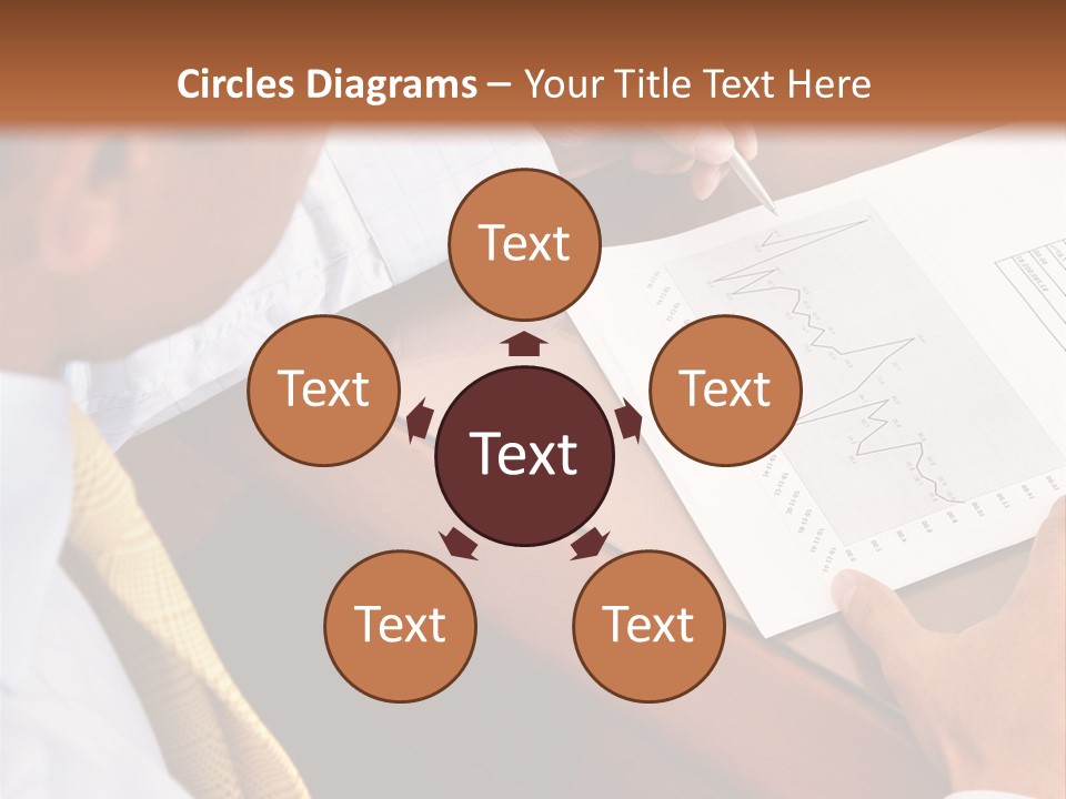 A Man Sitting At A Desk Writing On A Piece Of Paper PowerPoint Template