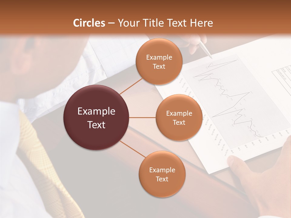 A Man Sitting At A Desk Writing On A Piece Of Paper PowerPoint Template