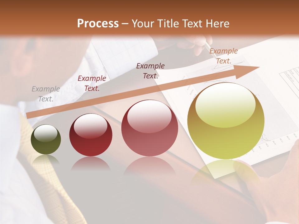 A Man Sitting At A Desk Writing On A Piece Of Paper PowerPoint Template