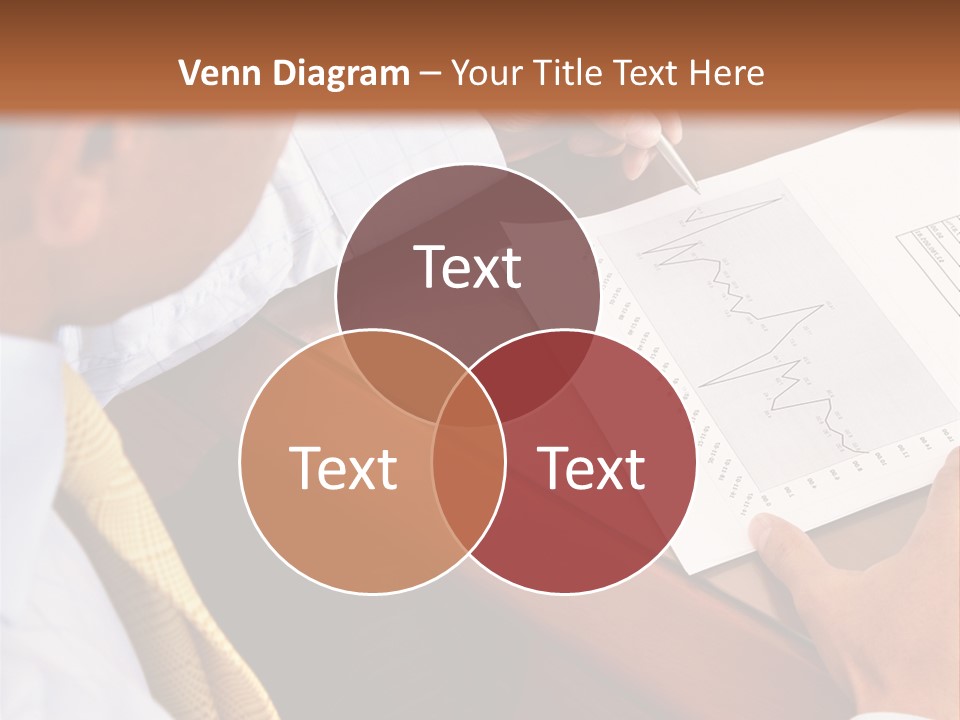 A Man Sitting At A Desk Writing On A Piece Of Paper PowerPoint Template