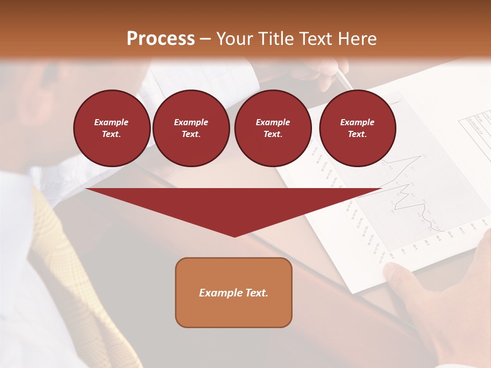 A Man Sitting At A Desk Writing On A Piece Of Paper PowerPoint Template