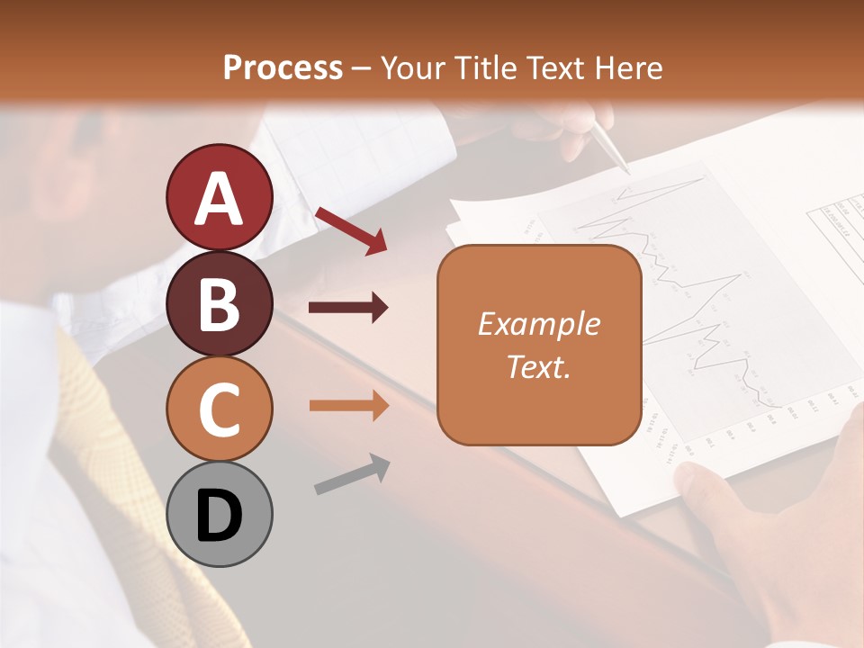 A Man Sitting At A Desk Writing On A Piece Of Paper PowerPoint Template