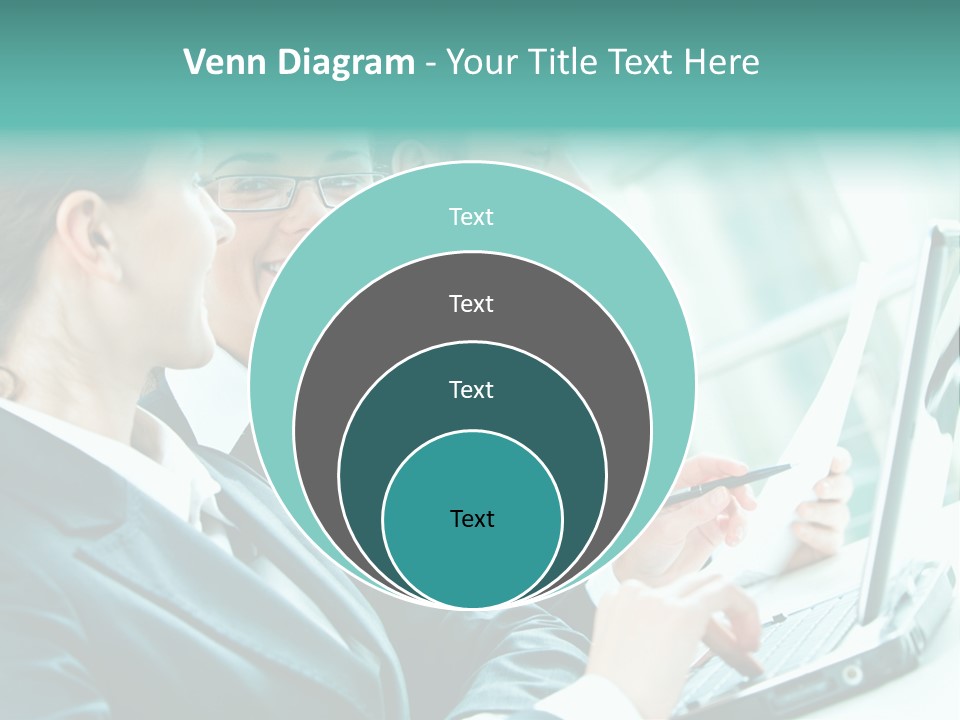 A Group Of People Sitting At A Table With A Laptop PowerPoint Template