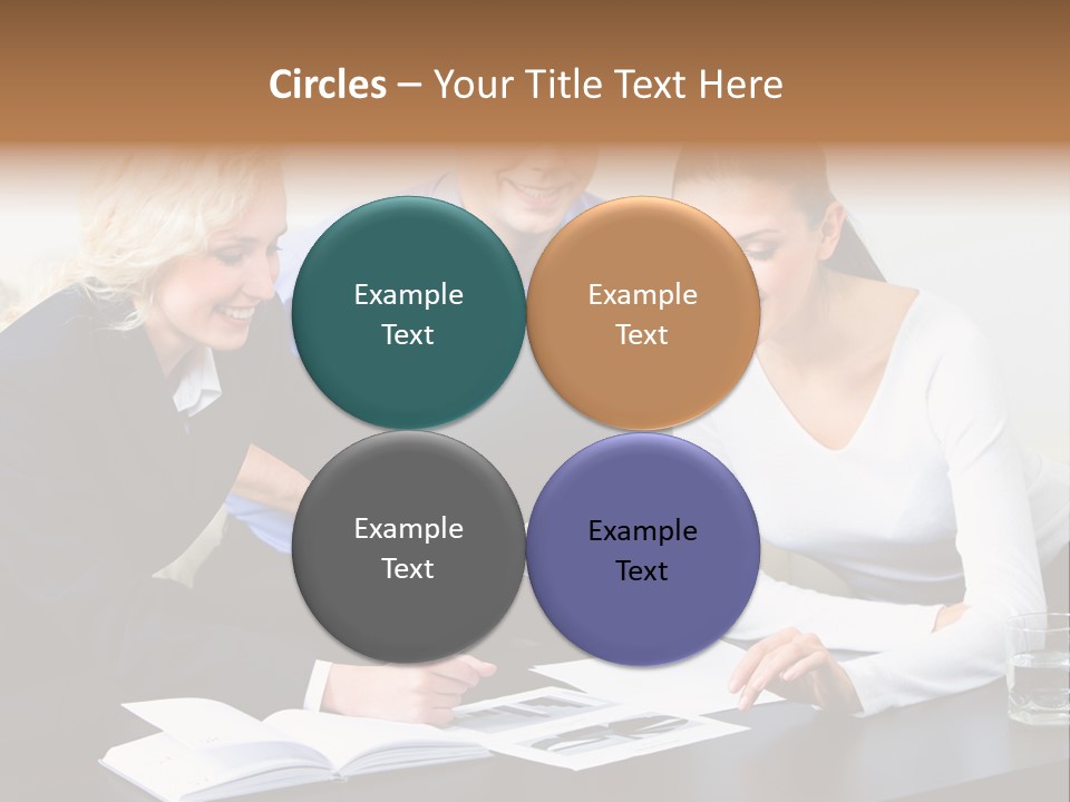 A Group Of People Sitting Around A Table With A Laptop PowerPoint Template