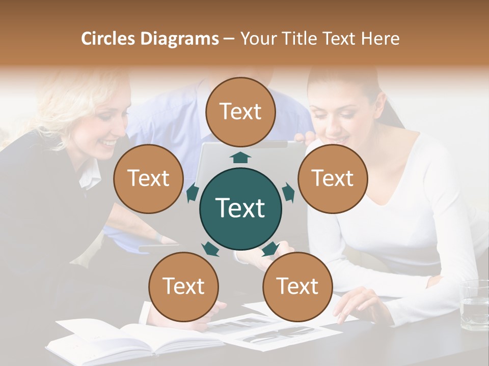 A Group Of People Sitting Around A Table With A Laptop PowerPoint Template