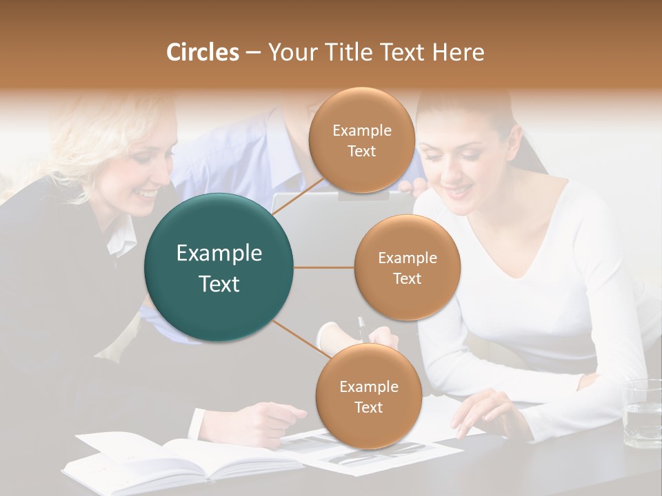 A Group Of People Sitting Around A Table With A Laptop PowerPoint Template