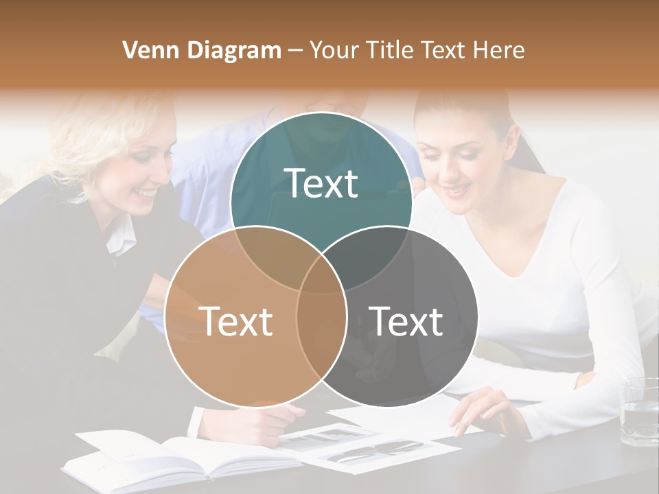 A Group Of People Sitting Around A Table With A Laptop PowerPoint Template