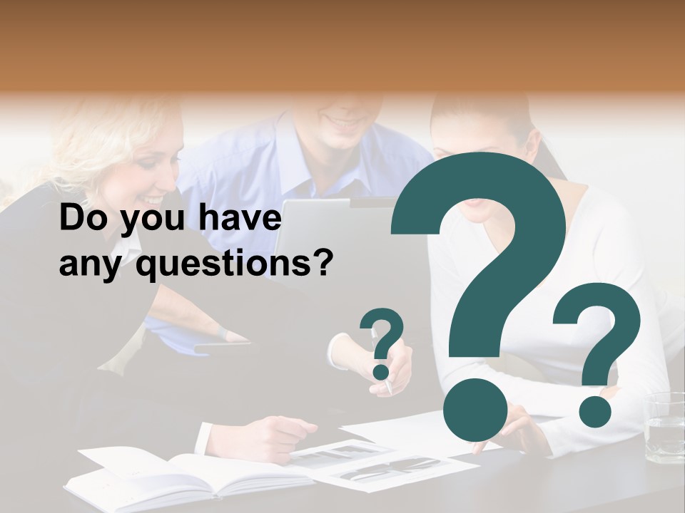 A Group Of People Sitting Around A Table With A Laptop PowerPoint Template