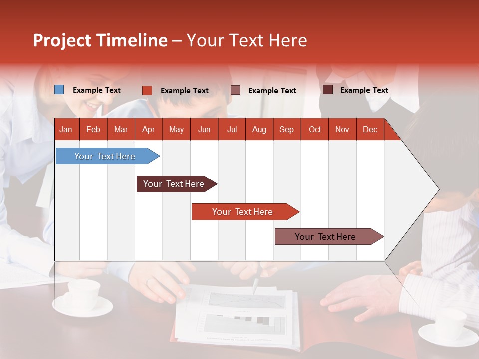 A Group Of People Sitting Around A Table Working On A Piece Of Paper PowerPoint Template