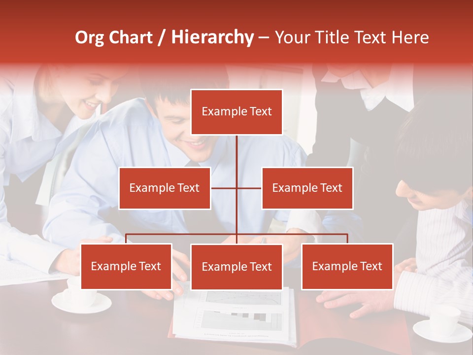 A Group Of People Sitting Around A Table Working On A Piece Of Paper PowerPoint Template