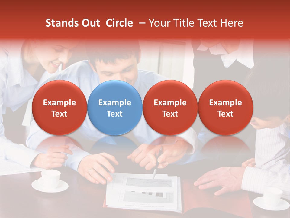 A Group Of People Sitting Around A Table Working On A Piece Of Paper PowerPoint Template