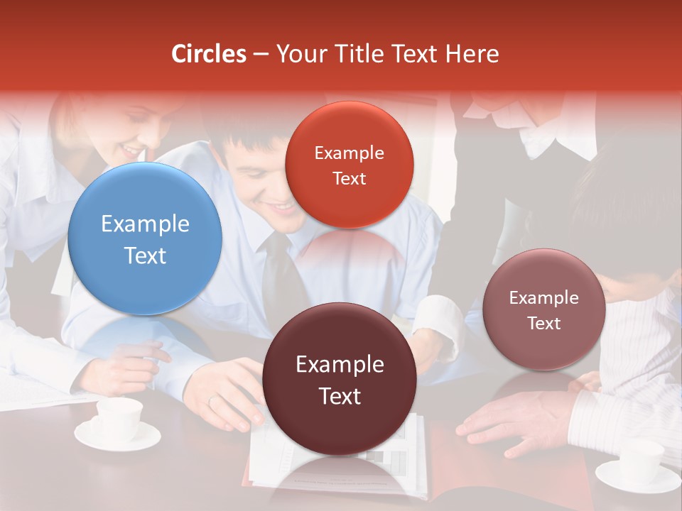 A Group Of People Sitting Around A Table Working On A Piece Of Paper PowerPoint Template