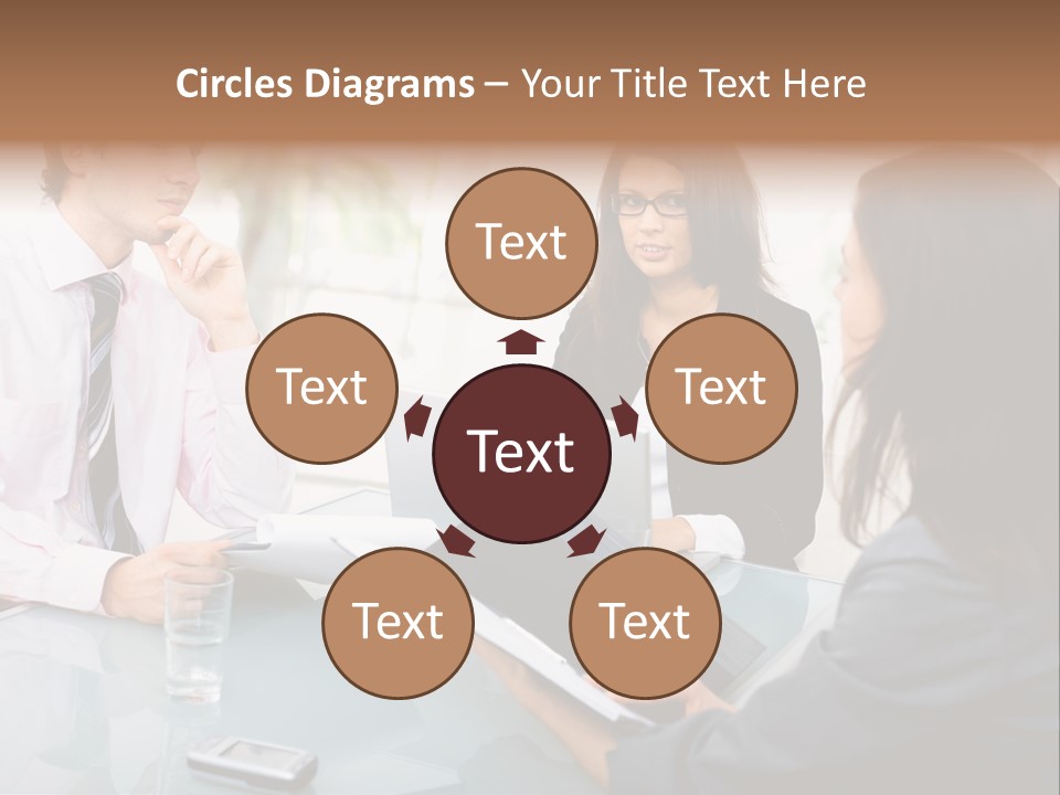 A Group Of People Sitting Around A Table With Laptops PowerPoint Template