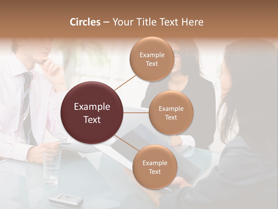 A Group Of People Sitting Around A Table With Laptops PowerPoint Template