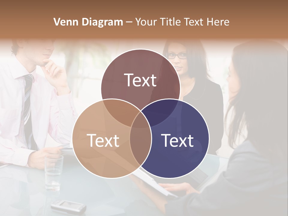 A Group Of People Sitting Around A Table With Laptops PowerPoint Template