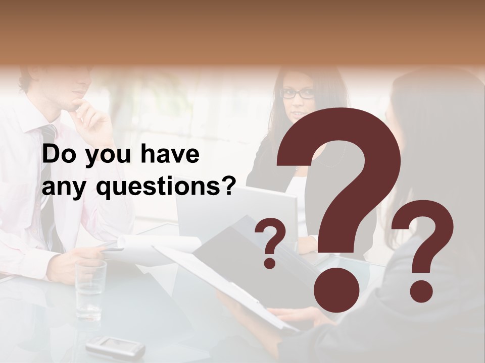 A Group Of People Sitting Around A Table With Laptops PowerPoint Template