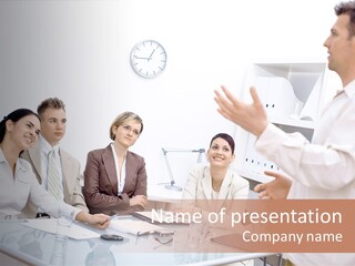 A Group Of Business People Sitting Around A Table PowerPoint Template