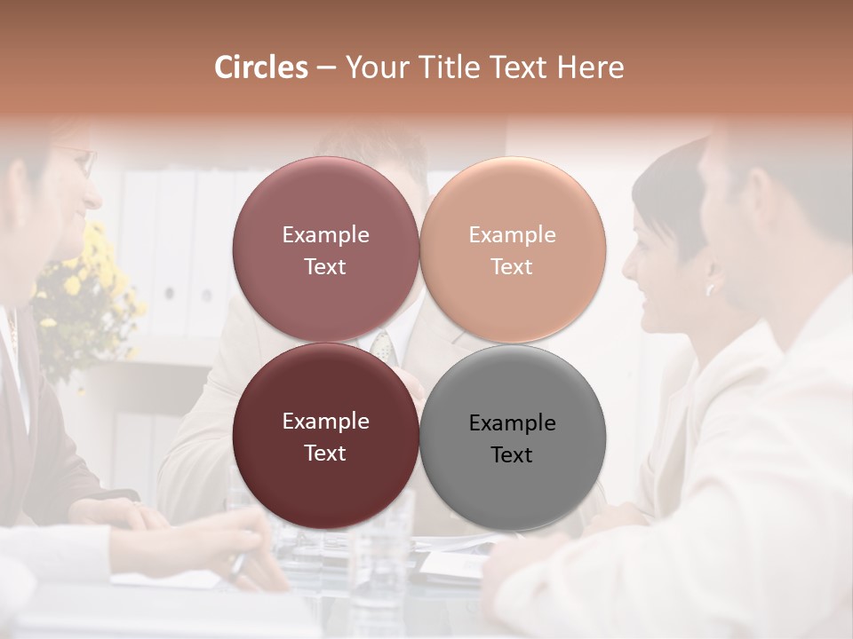A Group Of People Sitting Around A Table Talking PowerPoint Template