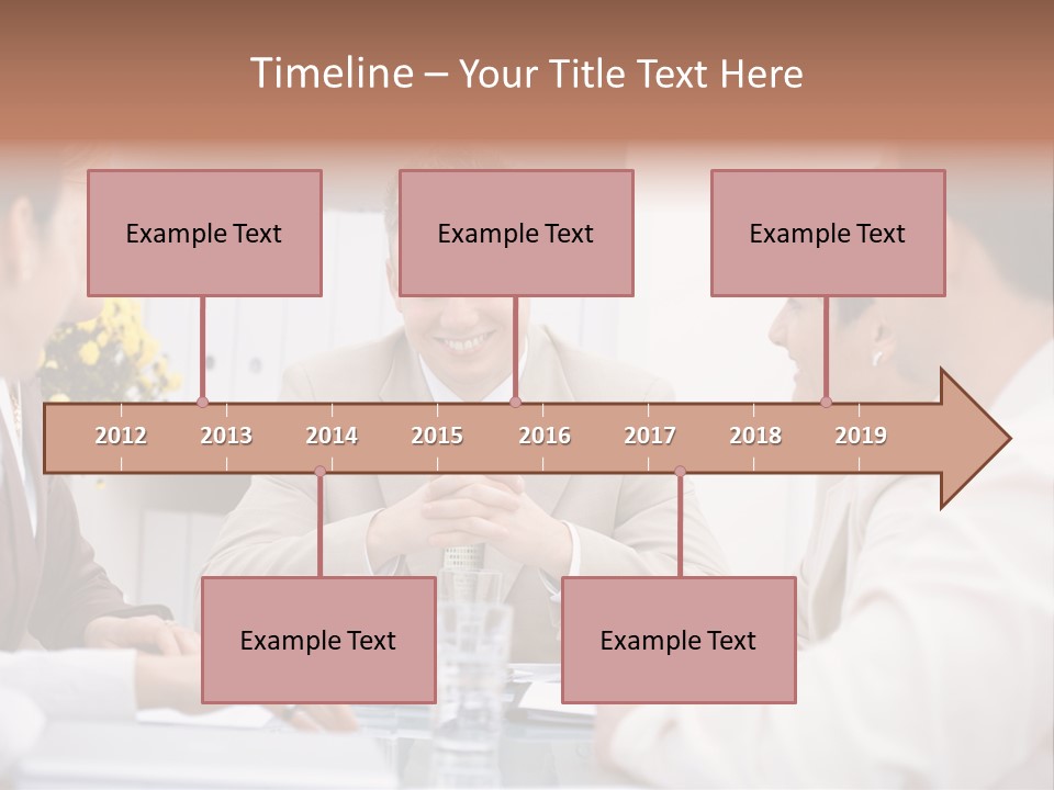 A Group Of People Sitting Around A Table Talking PowerPoint Template