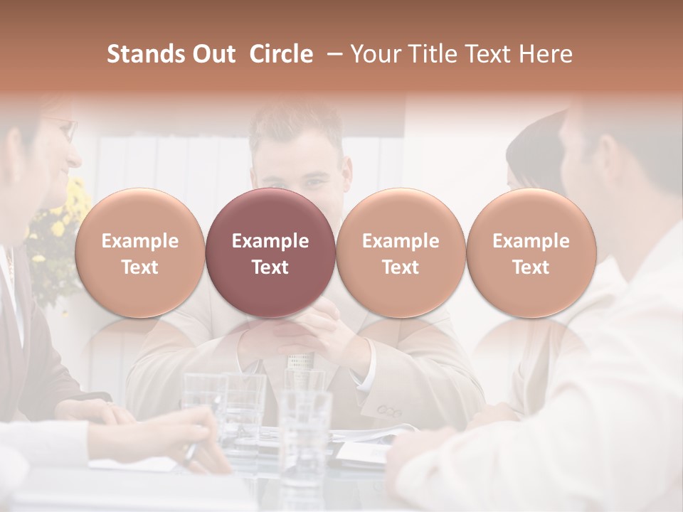 A Group Of People Sitting Around A Table Talking PowerPoint Template