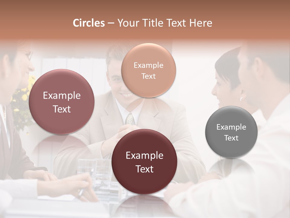 A Group Of People Sitting Around A Table Talking PowerPoint Template