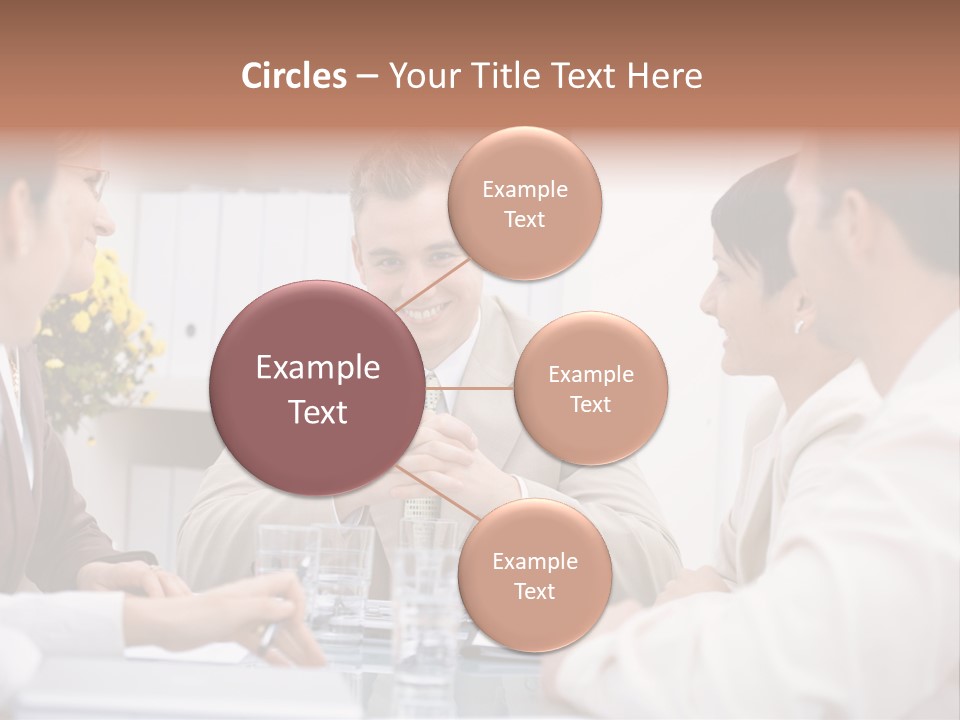 A Group Of People Sitting Around A Table Talking PowerPoint Template
