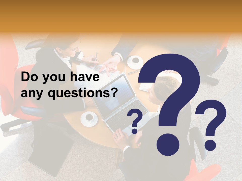 A Group Of People Sitting Around A Table With Laptops PowerPoint Template