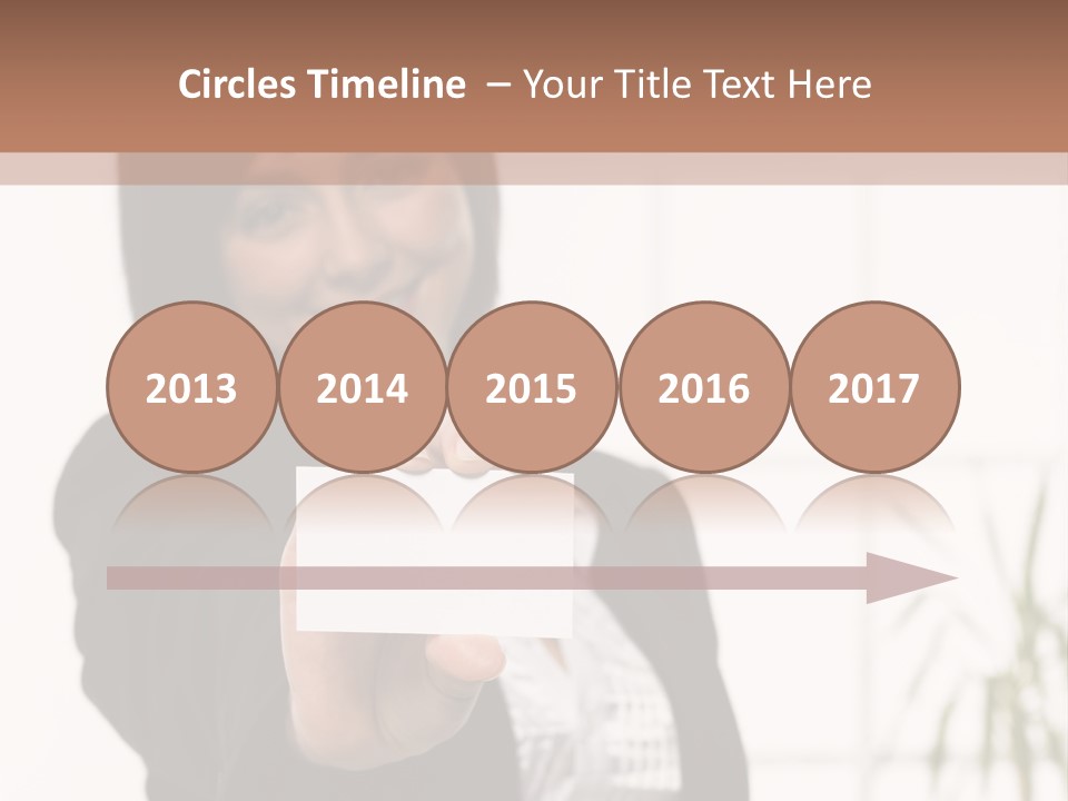 A Woman Holding A Business Card In Her Hand PowerPoint Template