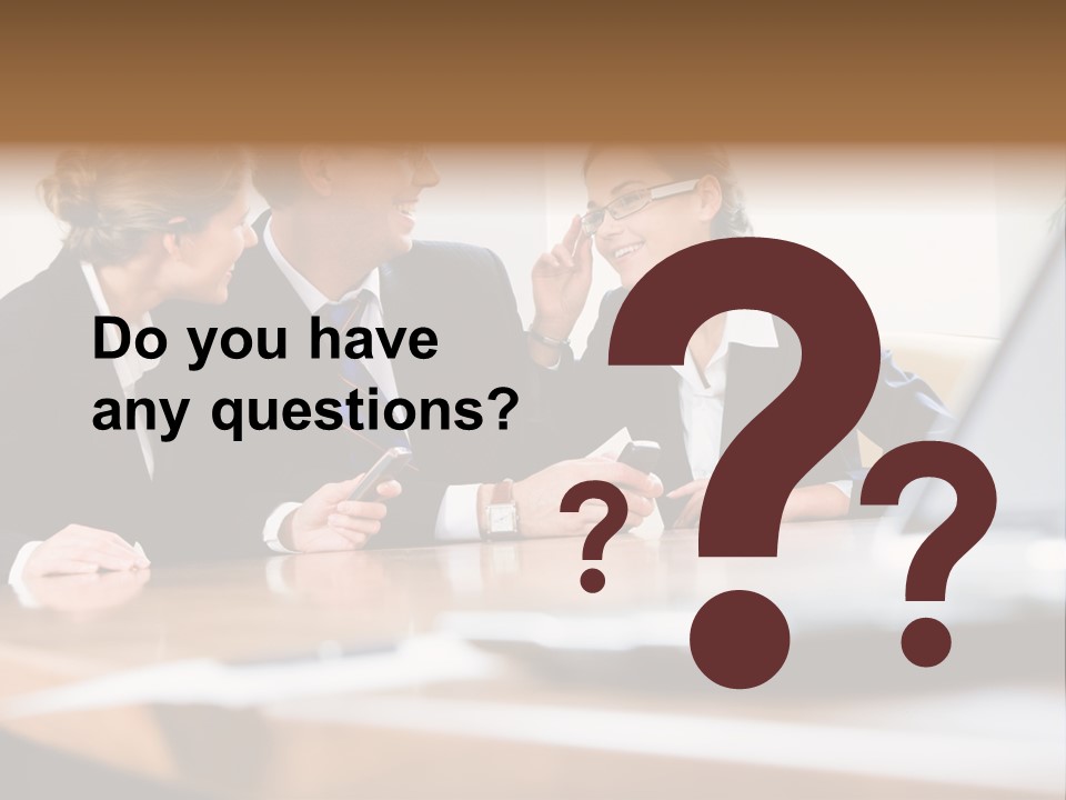 A Group Of Business People Sitting Around A Table PowerPoint Template