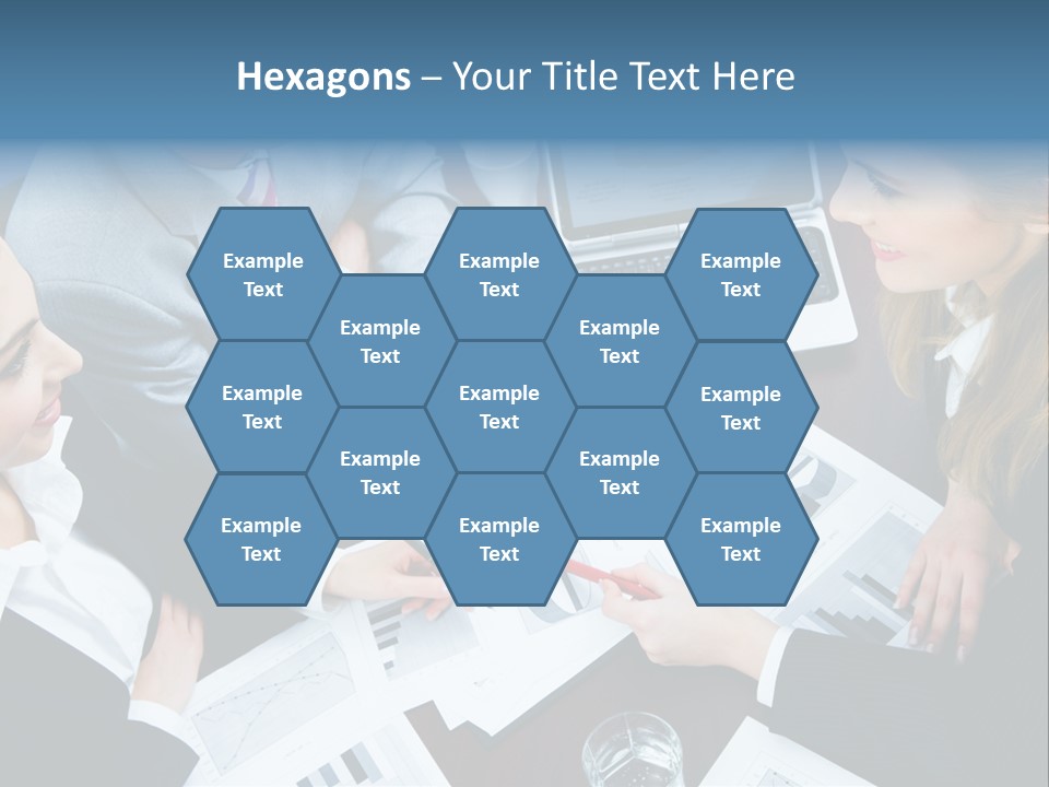 A Group Of People Sitting Around A Wooden Table PowerPoint Template