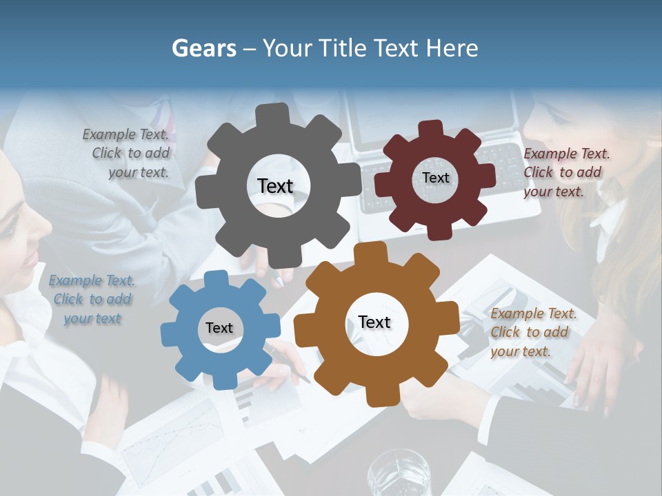 A Group Of People Sitting Around A Wooden Table PowerPoint Template