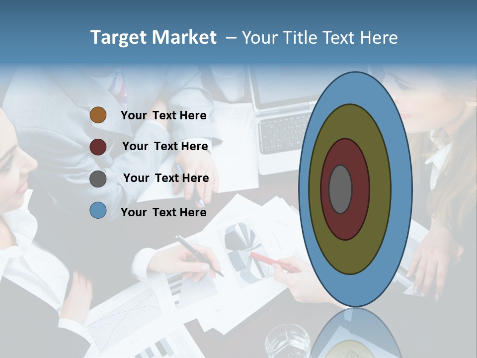 A Group Of People Sitting Around A Wooden Table PowerPoint Template